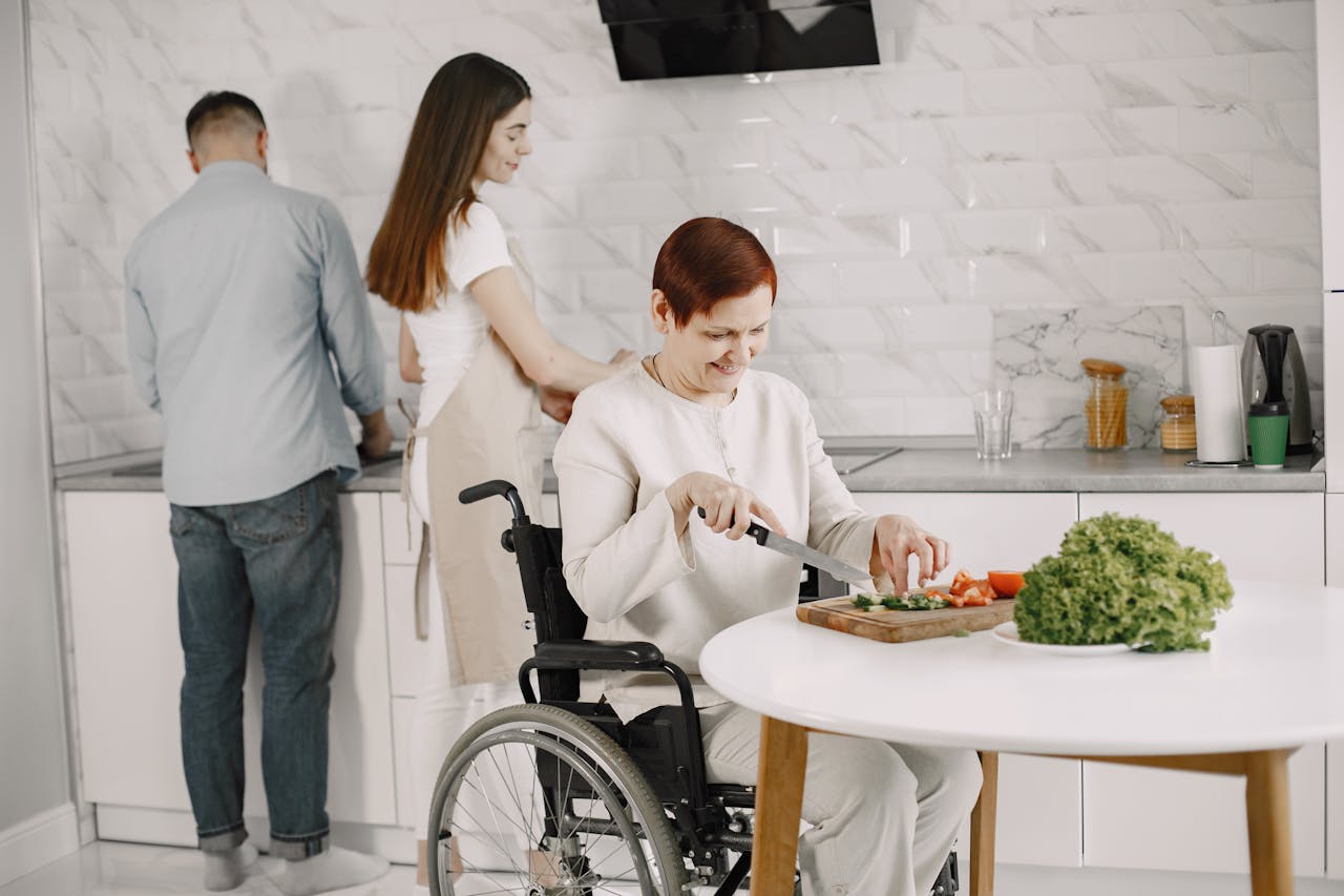 Women and Man in Kitchen